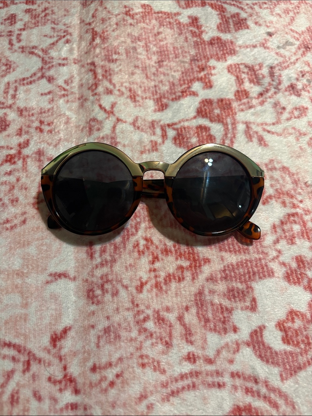 Round Tortoiseshell Sunglasses with Dark Lenses